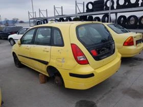 Suzuki Liana 1.3,1.6.-5бр., снимка 9