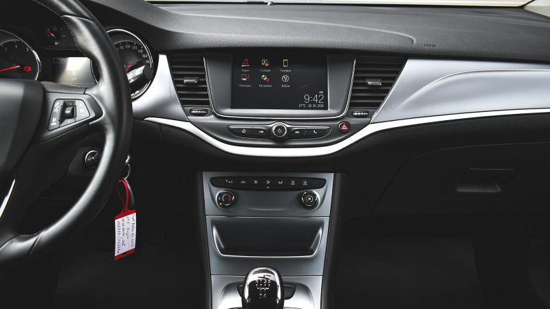 Opel Astra 1.4 Enjoy, снимка 11 - Автомобили и джипове - 46383864