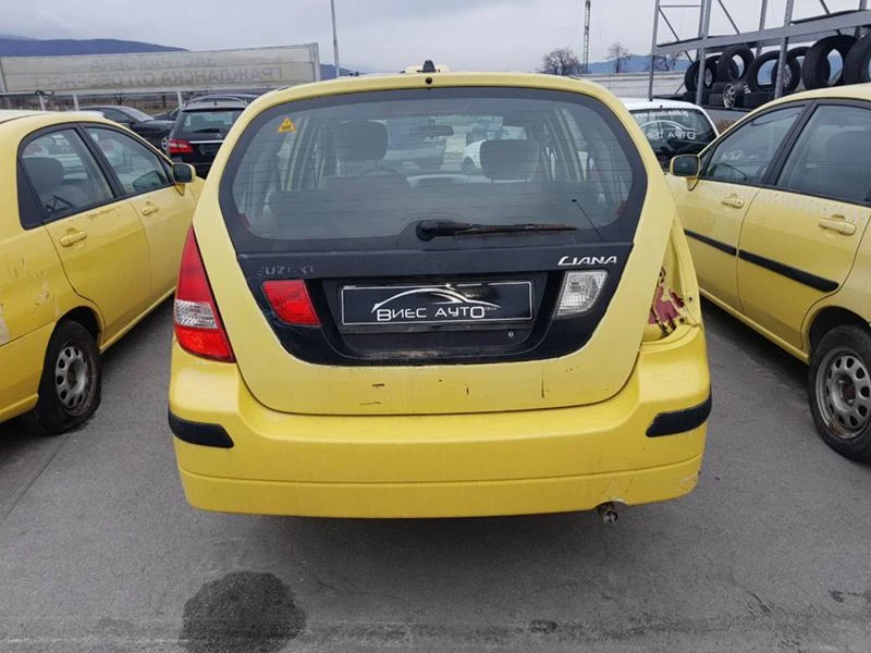 Suzuki Liana 1.3,1.6.-5бр., снимка 13 - Автомобили и джипове - 20321599