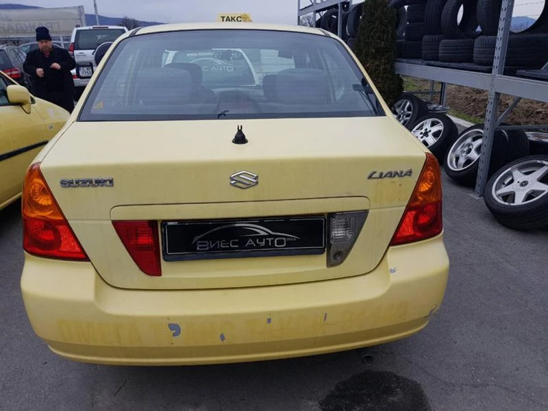 Suzuki Liana 1.3,1.6.-5бр., снимка 14 - Автомобили и джипове - 20321599