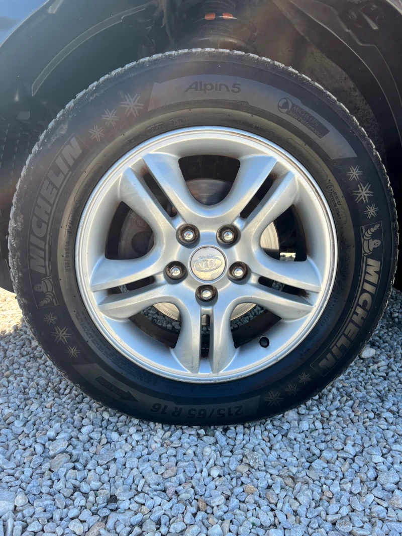 Kia Sportage 2.0 CRDi 4x4, снимка 17 - Автомобили и джипове - 49800287