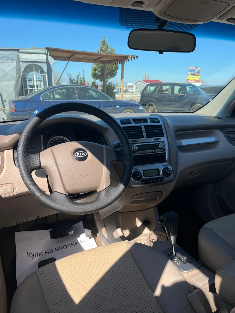 Kia Sportage 2.0 CRDi 4x4, снимка 6 - Автомобили и джипове - 49800287