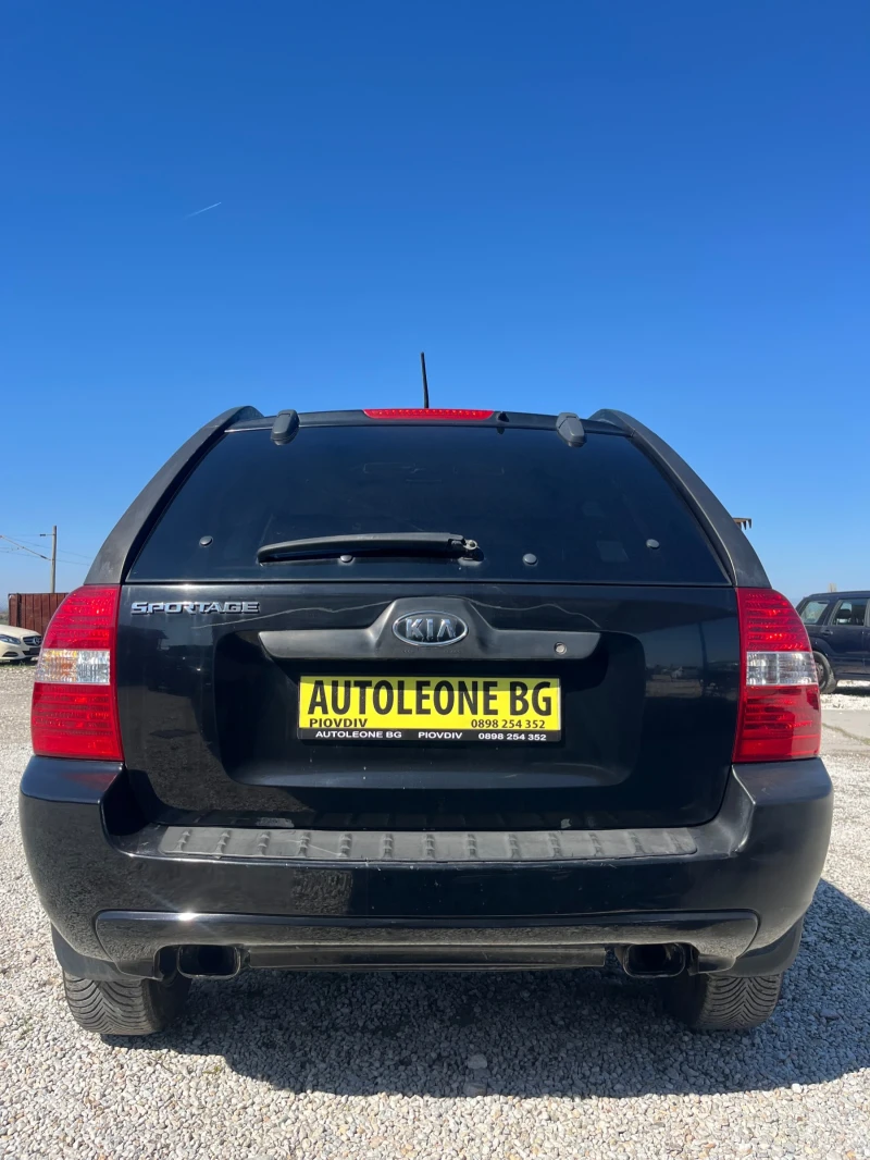 Kia Sportage 2.0 CRDi 4x4, снимка 4 - Автомобили и джипове - 49800287