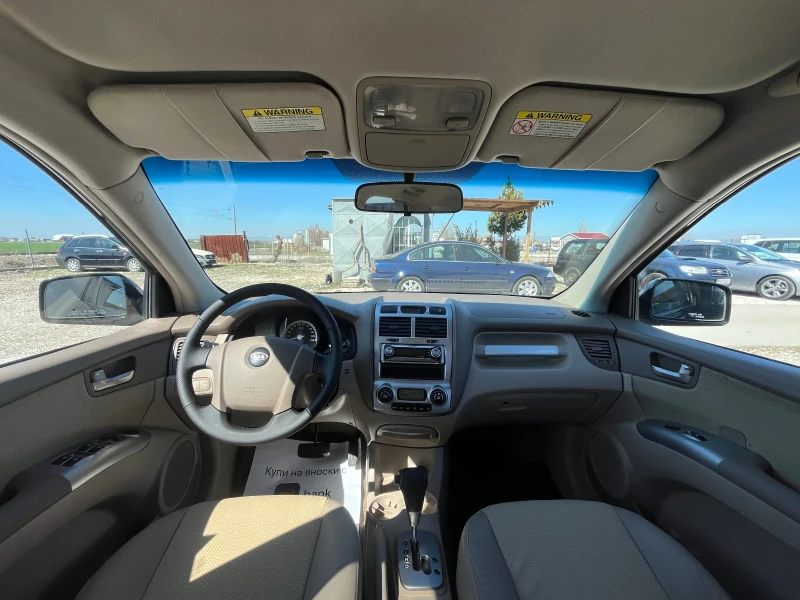 Kia Sportage 2.0 CRDi 4x4, снимка 10 - Автомобили и джипове - 49800287