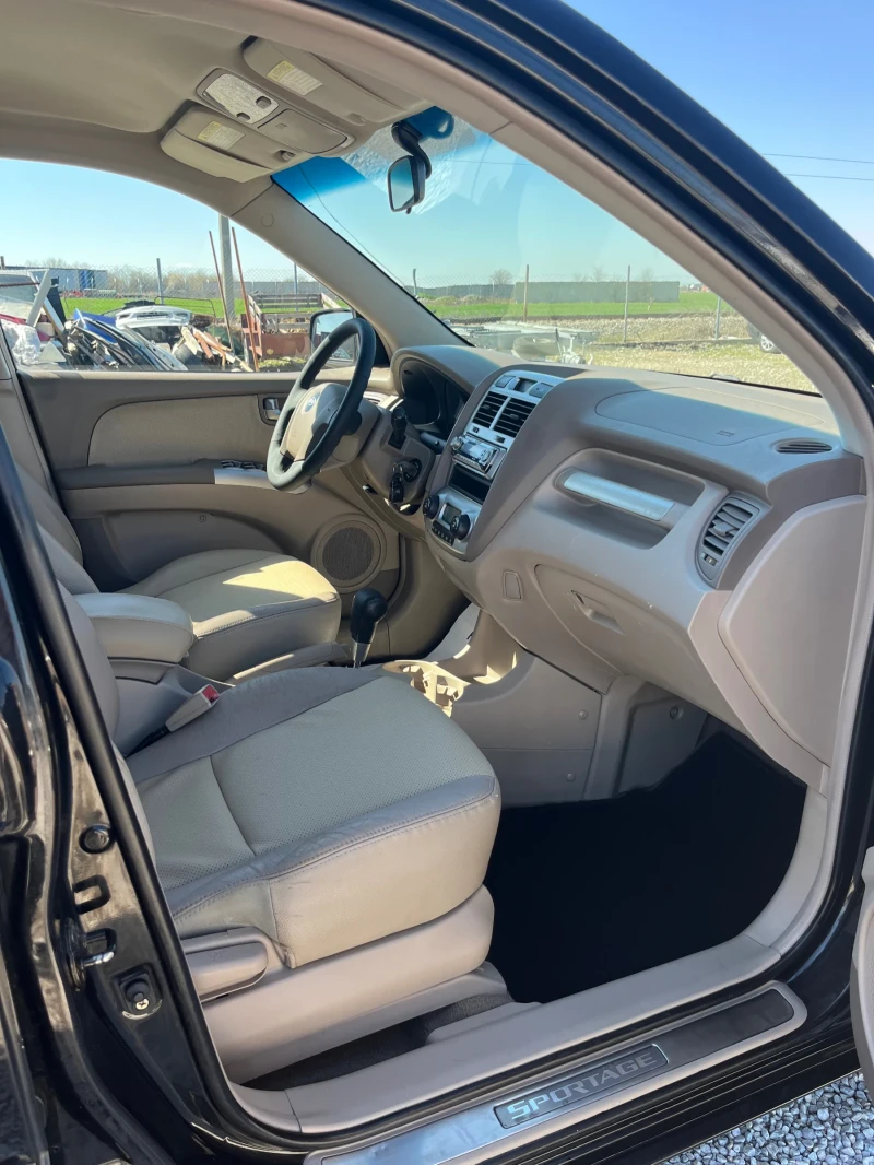Kia Sportage 2.0 CRDi 4x4, снимка 7 - Автомобили и джипове - 49800287