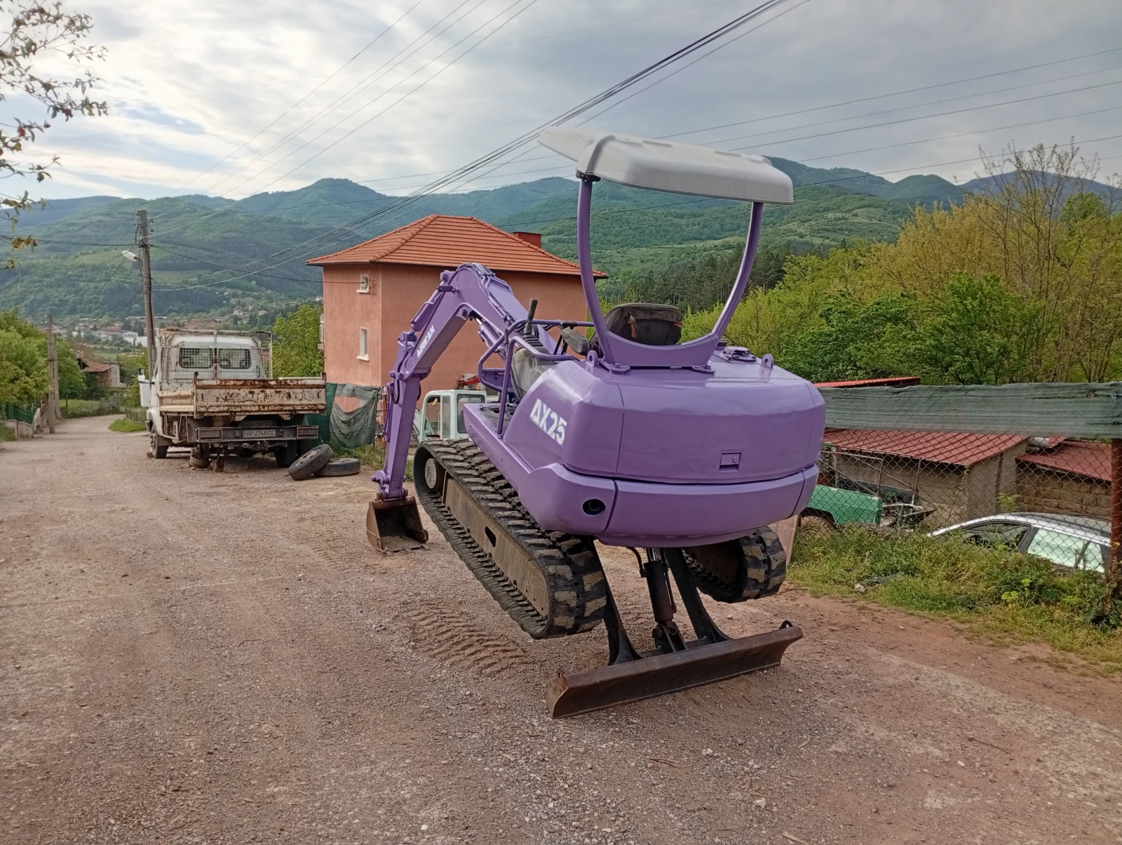 Багер Ammann AX 25
