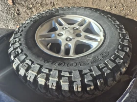 Jeep Grand cherokee 4.7, снимка 15 - Автомобили и джипове - 53375299