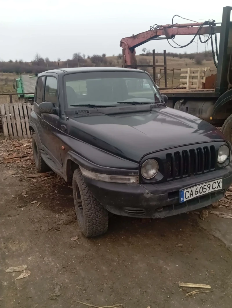 SsangYong Korando Sports, снимка 2 - Автомобили и джипове - 52987363