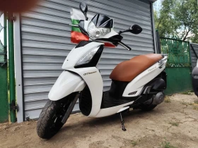     Kymco People GT 300 sport.