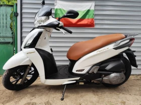     Kymco People GT 300 sport.