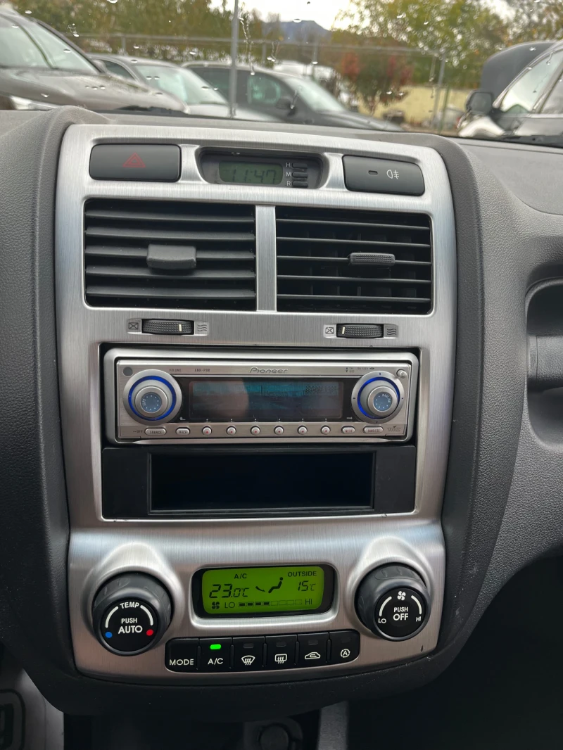 Kia Sportage 2.0i 4WD, снимка 11 - Автомобили и джипове - 52380999