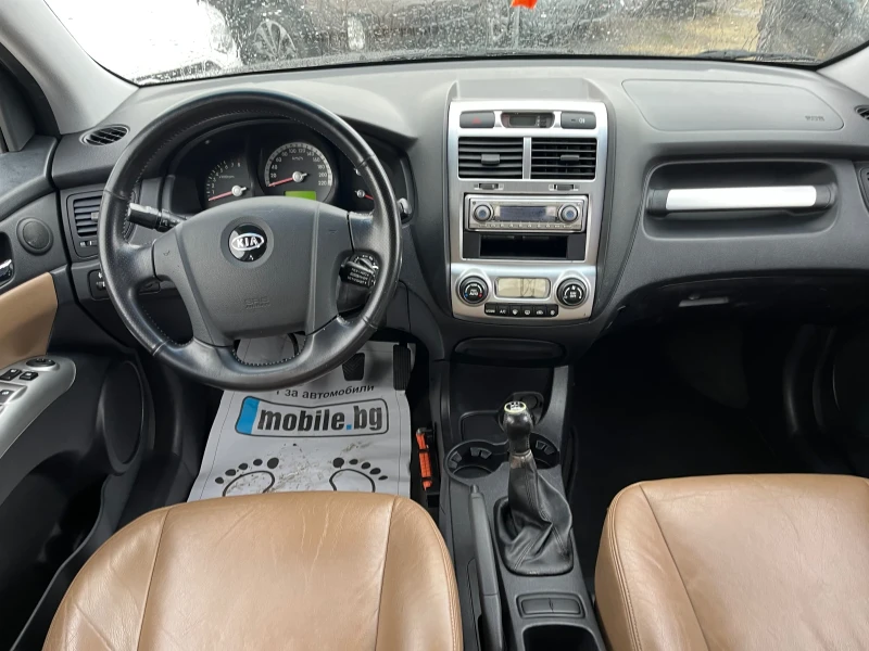 Kia Sportage 2.0i 4WD, снимка 12 - Автомобили и джипове - 52380999