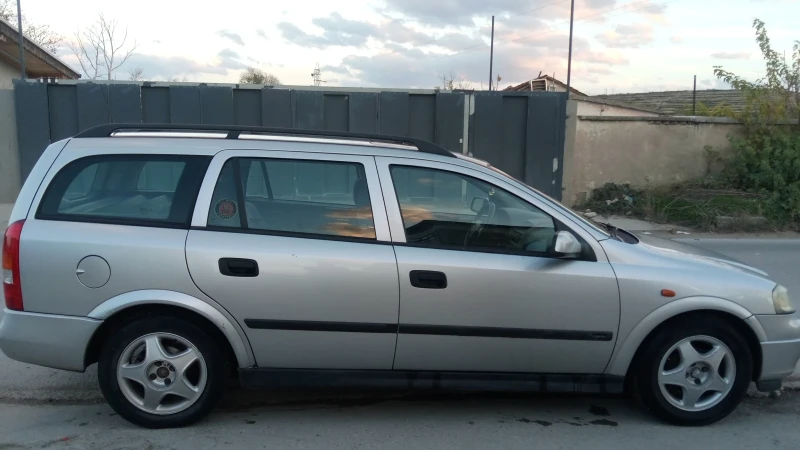 Opel Astra, снимка 7 - Автомобили и джипове - 52642732