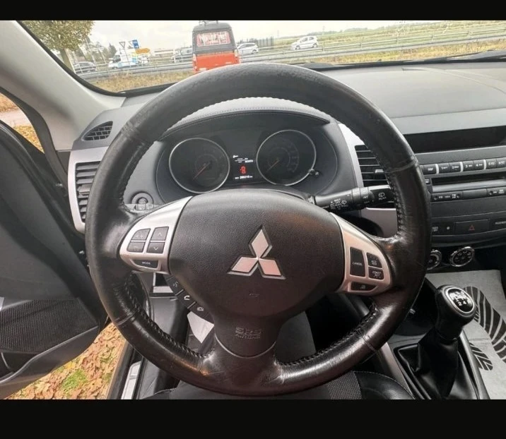 Mitsubishi Outlander 2.0 газ/бензин , снимка 9 - Автомобили и джипове - 47813474