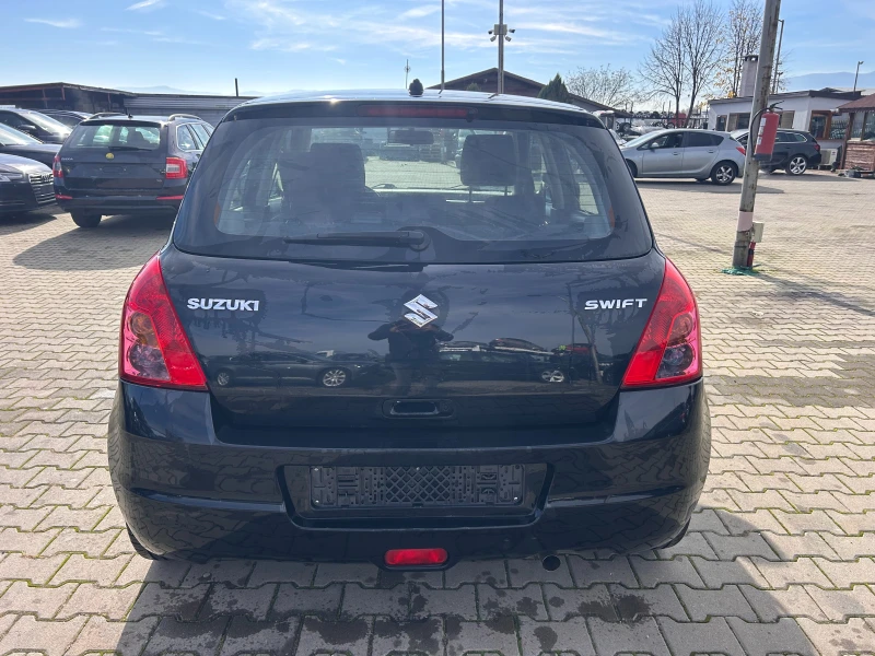 Suzuki Swift 1.3i NAVI EURO 4, снимка 7 - Автомобили и джипове - 52390781