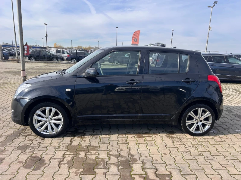 Suzuki Swift 1.3i NAVI EURO 4, снимка 9 - Автомобили и джипове - 52390781