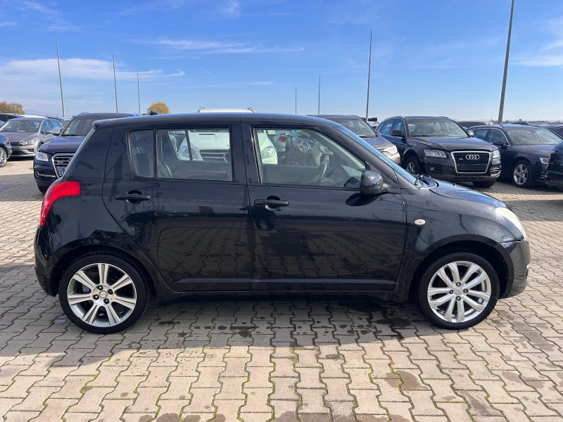 Suzuki Swift 1.3i NAVI EURO 4, снимка 5 - Автомобили и джипове - 52390781
