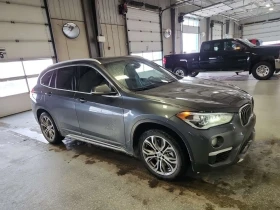 BMW X1 XDRIVE28I * PANORAMA* 2 KEYS* CARFAX *  - 17999 € / 35202.98 лв. - 32613861 2