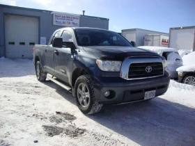 Toyota Tundra * 4WD Double Cab 146" 5.7L SR5 V8 * CARFAX * Ц - 15400 € / 30119.78 лв. - 40985831 3