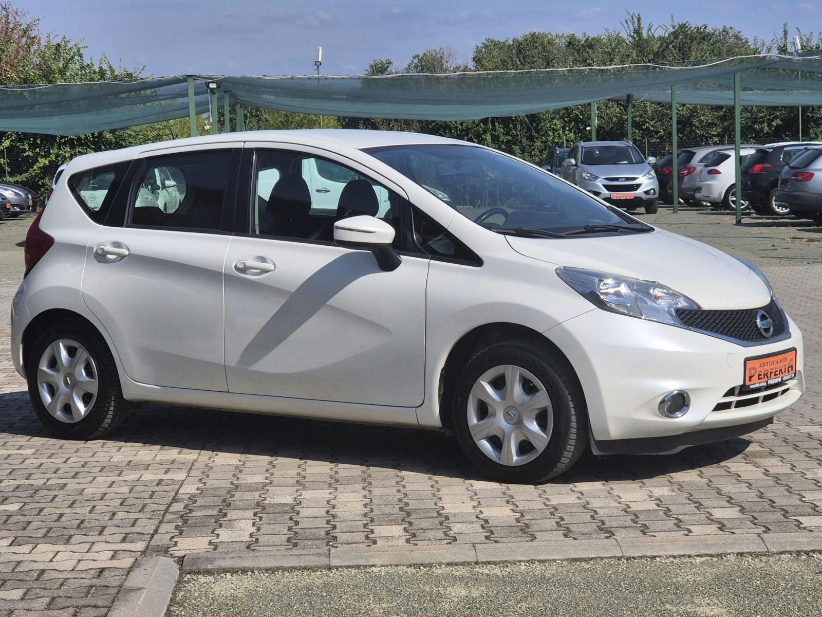 Nissan Note 1.2 бензин 80к.с. - изображение 6
