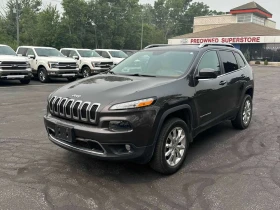 ������ Jeep Cherokee