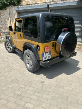 Jeep Wrangler 4.0i - 14500 € / 28359.53 лв. - 63538870 4