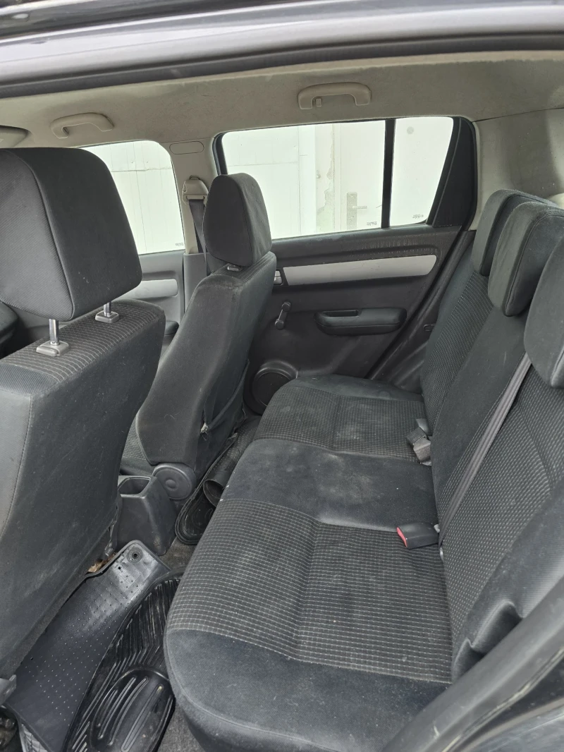 Suzuki Swift 1.3 DDIS, снимка 11 - Автомобили и джипове - 52298845