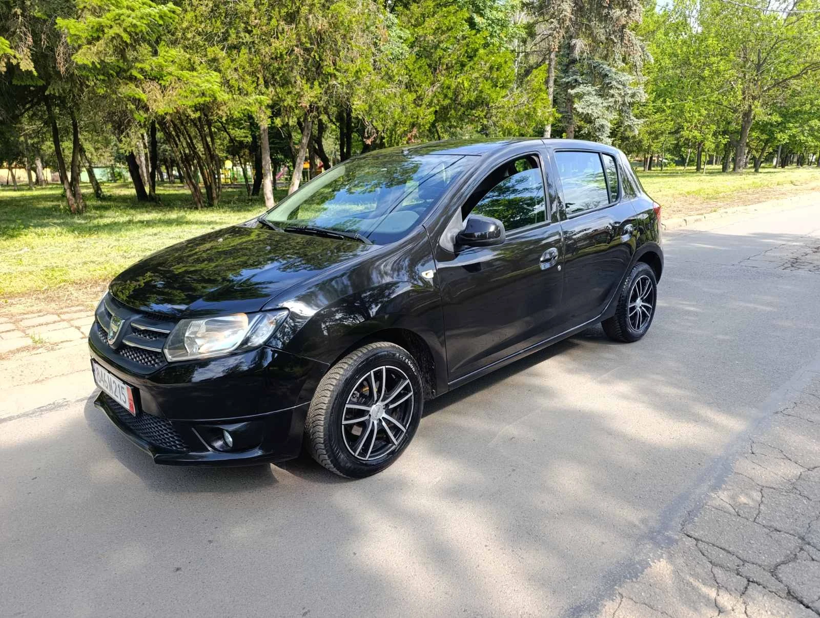 Dacia Sandero 2013г. Газ/бензин, навигация, снимка 9 - Автомобили и джипове - 54628499