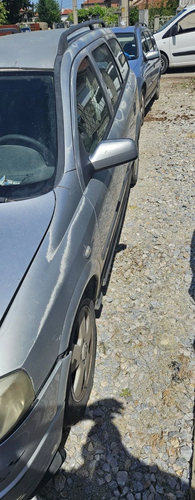 Opel Astra, снимка 4 - Автомобили и джипове - 54873895