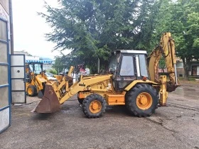 Багер Cat 438B, снимка 1