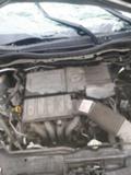 Mazda 2, снимка 11 - Автомобили и джипове - 23532852