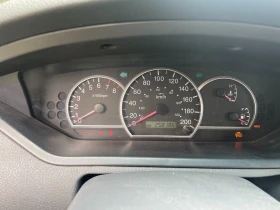 Kia Carens 1.6 Газ/Бензин, снимка 12