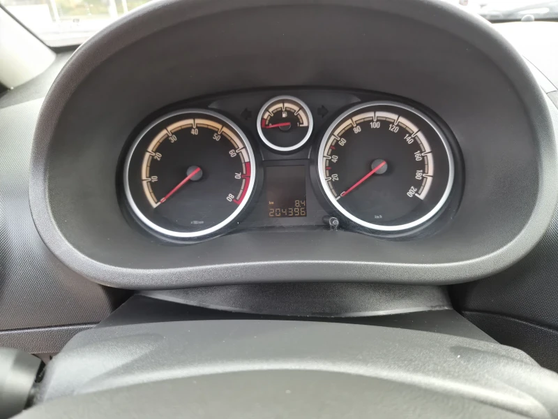 Opel Corsa 1.2i 16V ECOTEC (80 кс) Automatic, снимка 11 - Автомобили и джипове - 52074934