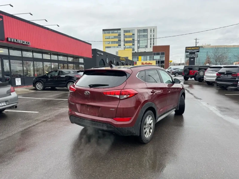 Hyundai Tucson * LUXURY AWD * CARFAX* ОПЦИЯ ЗА ФИНАНСИРАНЕ* , снимка 6 - Автомобили и джипове - 53233505