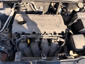 Hyundai IX35 2.0i 16v, снимка 11