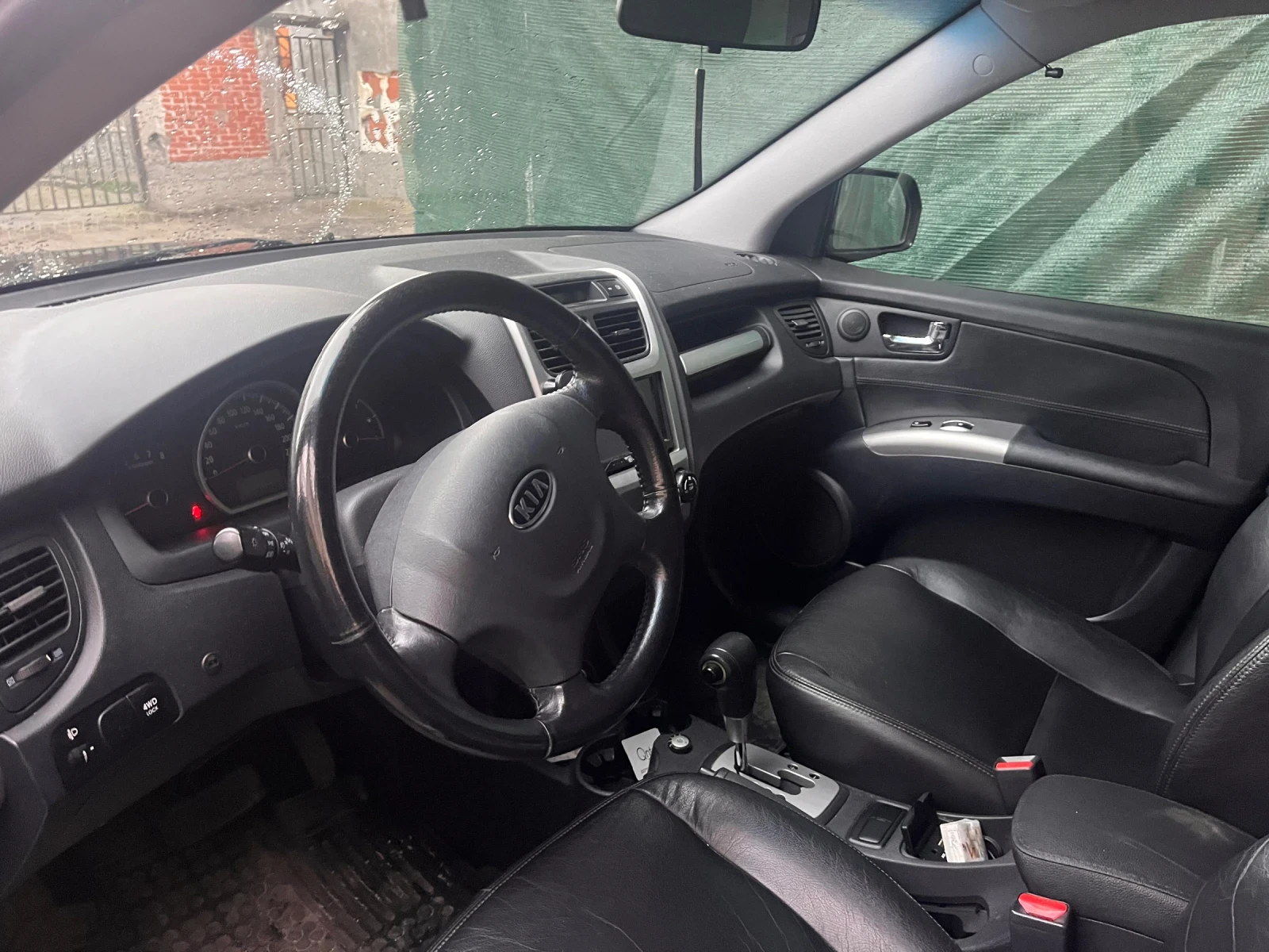 Kia Sportage 2.7 ГАЗ, снимка 8 - Автомобили и джипове - 56659355