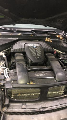     BMW X5 4.8i ~1 234 .