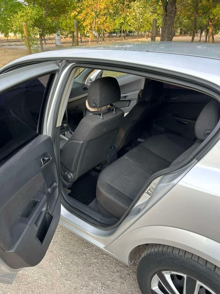 Opel Astra, снимка 11 - Автомобили и джипове - 56011408