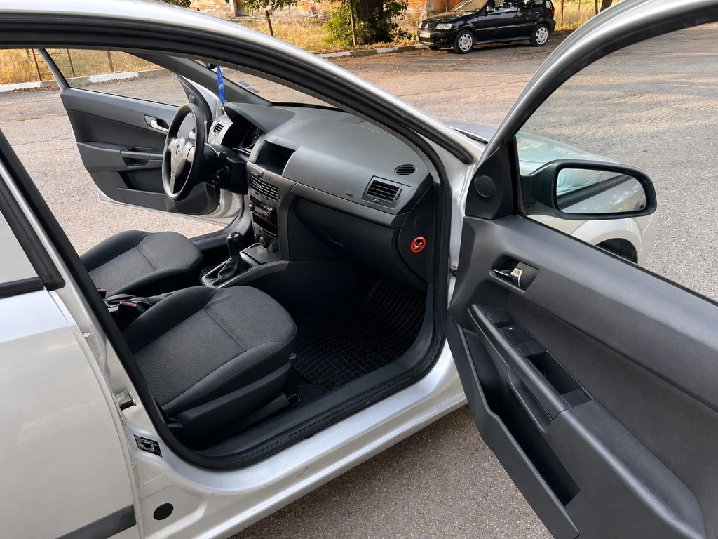 Opel Astra, снимка 8 - Автомобили и джипове - 56011408