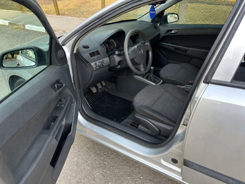 Opel Astra, снимка 7 - Автомобили и джипове - 56011408