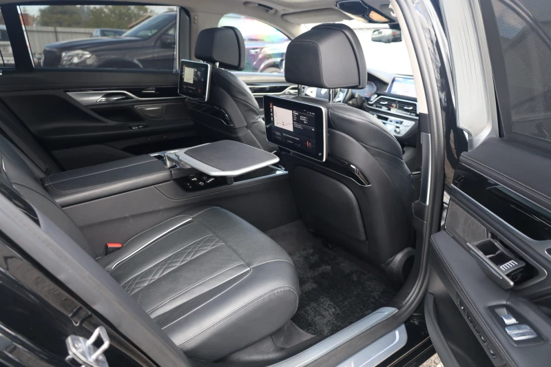 BMW 750 iL xDrive 360 SoftClo MASSAGE PANO HuD FULL iCarbg, снимка 7 - Автомобили и джипове - 52011381