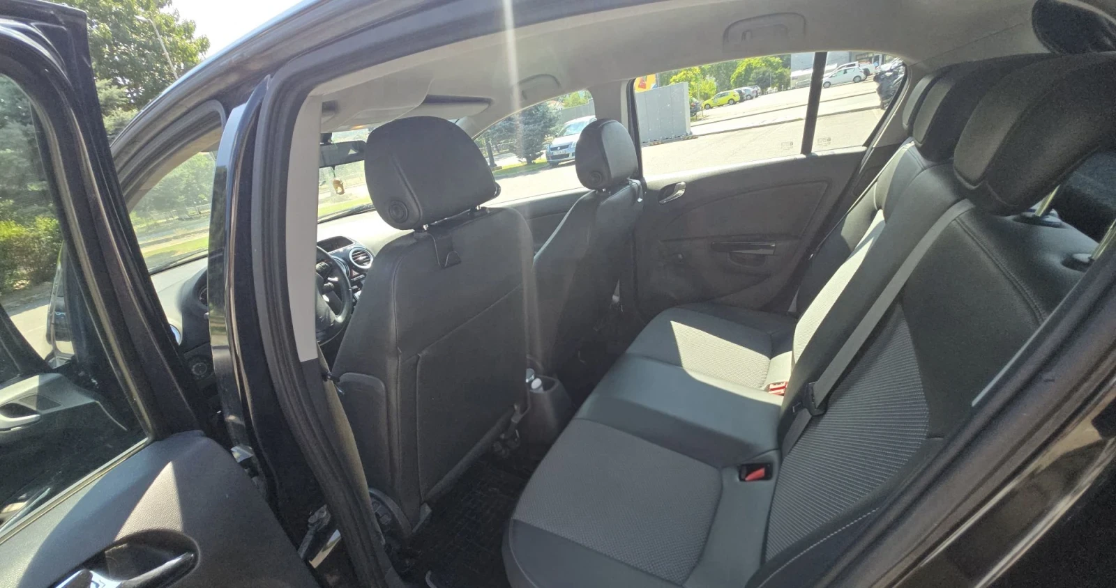 Opel Corsa D 1.4i, снимка 10 - Автомобили и джипове - 55778383