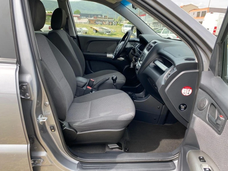 Kia Sportage 2.0i Bi-Fuel * , снимка 10 - Автомобили и джипове - 46746858