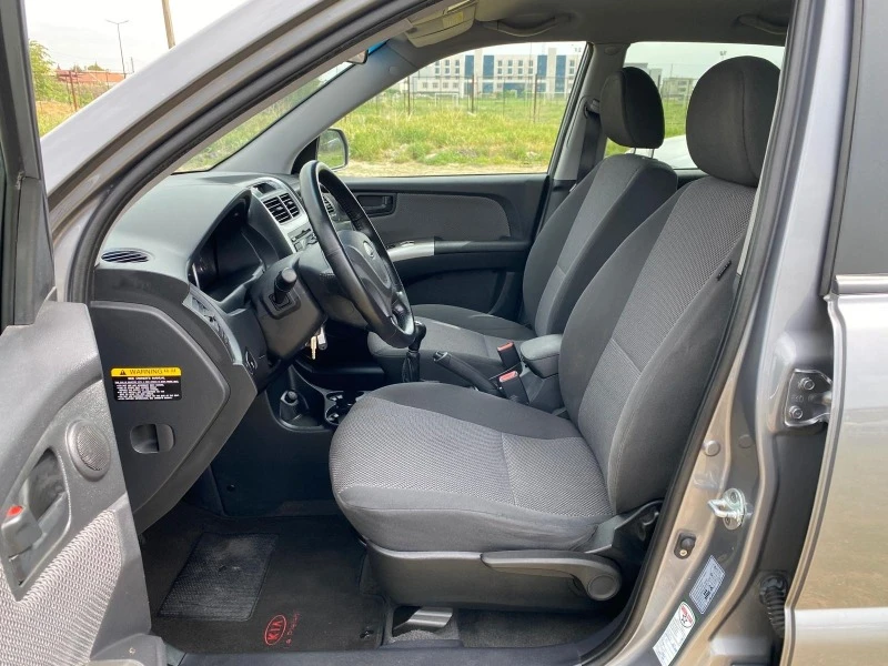 Kia Sportage 2.0i Bi-Fuel * , снимка 8 - Автомобили и джипове - 46746858