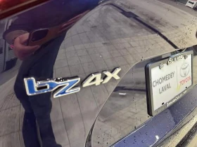 Toyota bZ4X LE* Подгрев* Камера* Sunroof* От представителство - 26900 € / 52611.83 лв. - 12490767 17