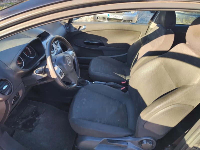 Opel Corsa 1.3 MJET , снимка 9 - Автомобили и джипове - 48029232