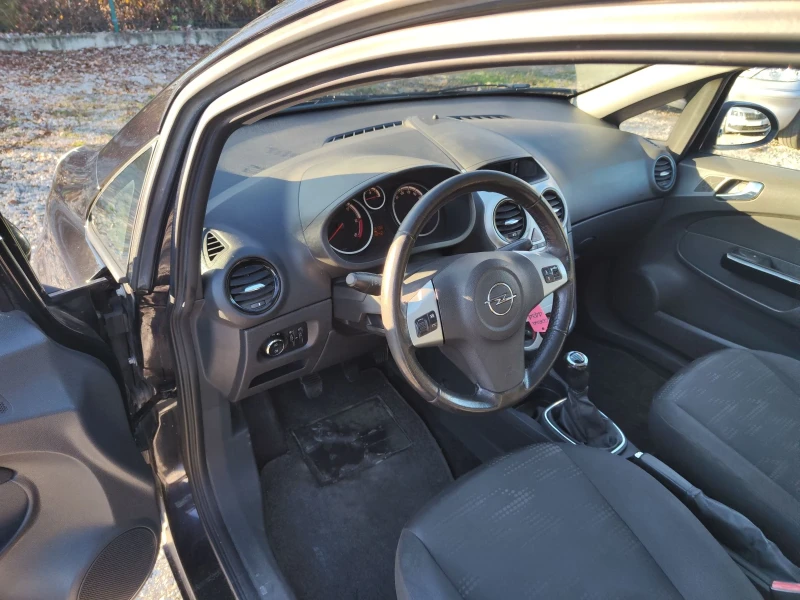 Opel Corsa 1.3 MJET , снимка 11 - Автомобили и джипове - 48029232