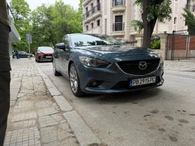 ������ Mazda 6