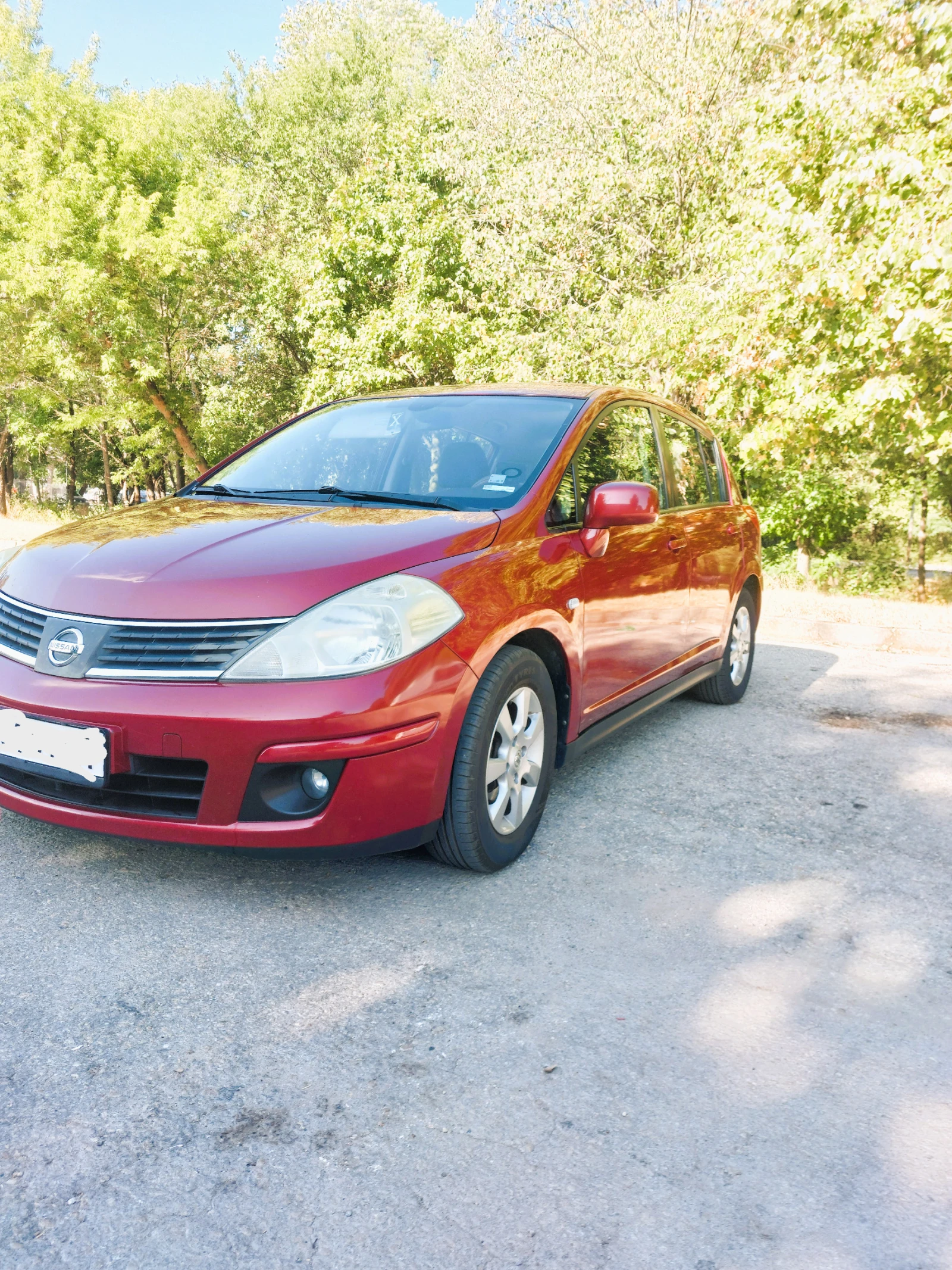 Nissan Tiida  - изображение 2