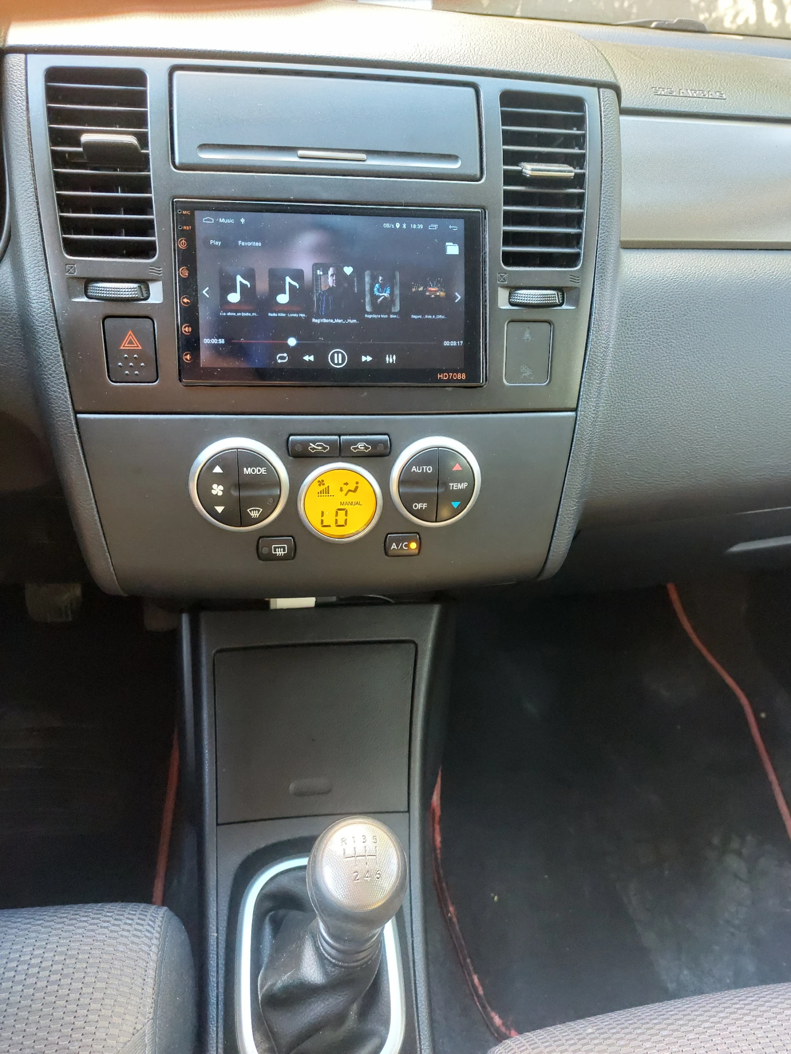 Nissan Tiida  - изображение 9